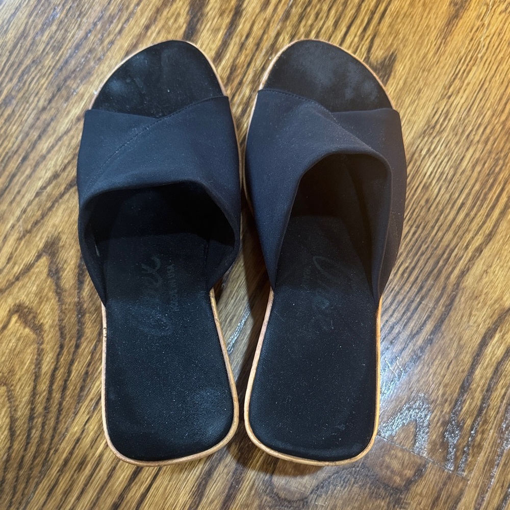 Onex Black Crisscross Slide Mules with Tan Trim